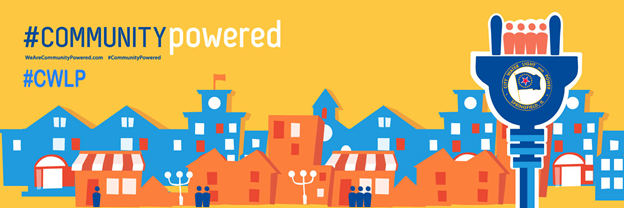 Illustration with a bright yellow background featuring a stylized cityscape of blue and orange buildings. On the left, large white text reads '#COMMUNITYpowered' and below it '#CWLP' with the website 'VisitCommunityPowered.com'. On the right, a large blue power plug icon with a raised fist holding silhouettes of people, incorporating the City Water, Light and Power (CWLP) logo of Springfield, Illinois.